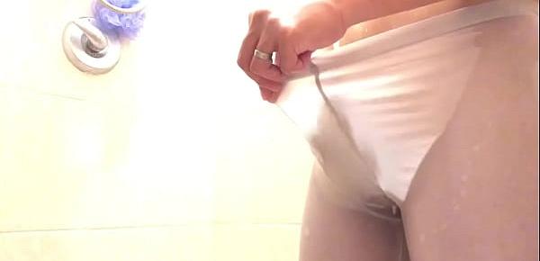  Jerk off in the shower wearing my sheer white leggings
